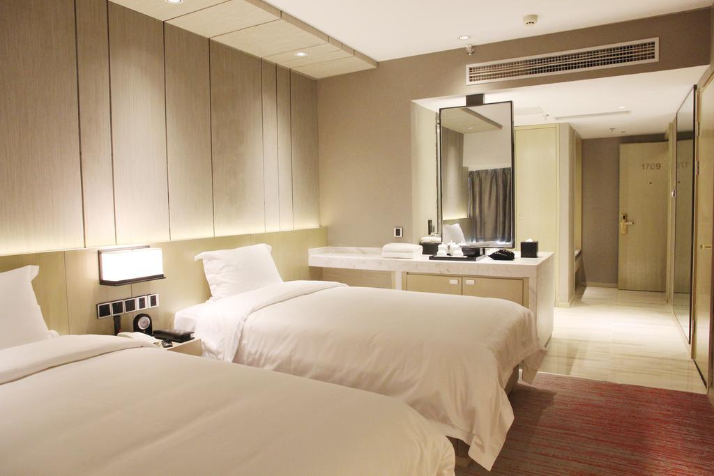 Shenyang Oriental Ginza International Hotel Quarto foto
